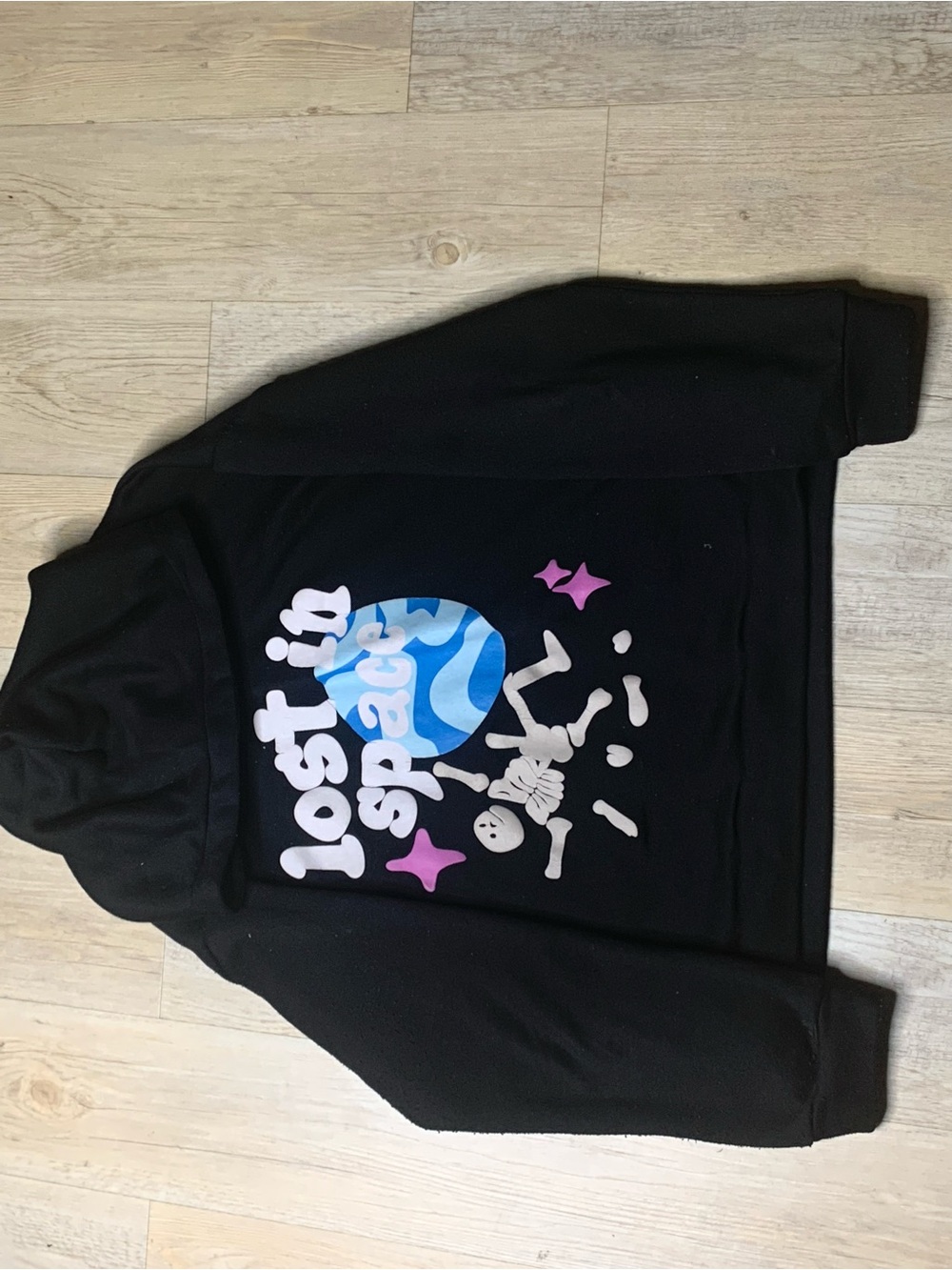 Black Graphic Puffer Jacket with 'Lost in Space' Print